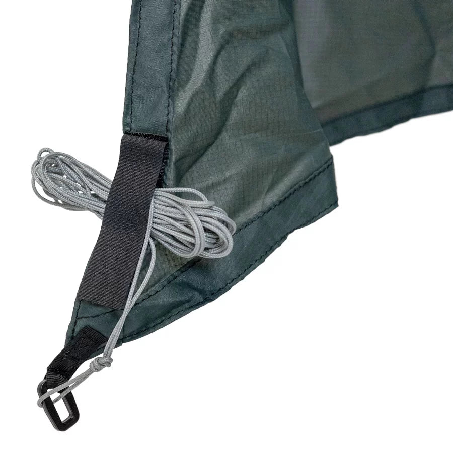 Tie-out cord stowed at a corner of the Clark Rain Fly XL