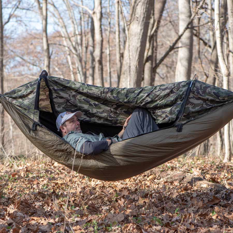 Camper lying in a Clark NX-270 fitted with a Z-Liner underquilt